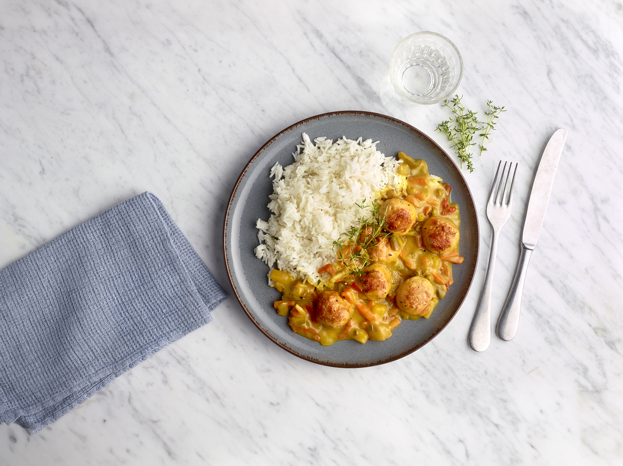 Bosto recept - Gehaktballetjes in currysaus met basmatirijst